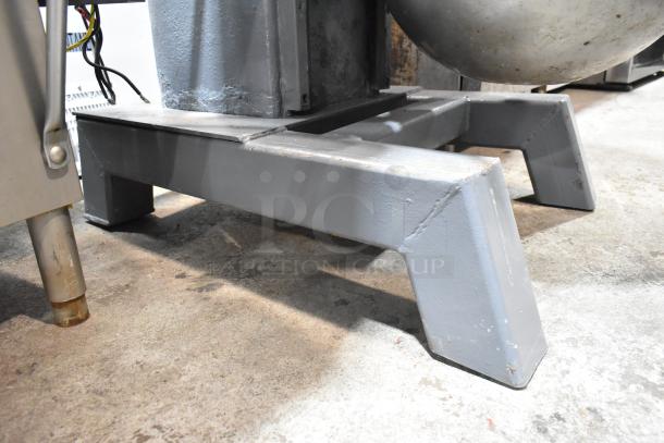 Hobart H 600T mixer base, showing sturdy construction and gray finish. 60-quart capacity and heavy-duty design.