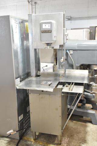 Hobart 5614 commercial meat saw, floor style, 200-230V, 3 phase. Stainless steel, used condition, visible Hobart label.