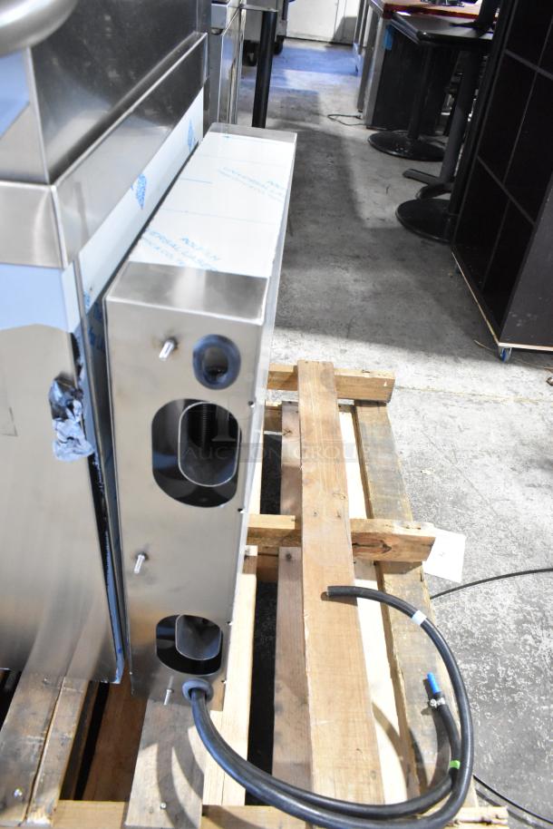 BRAND NEW Noble 495NODTVL1 Ventless High Temp Dishwasher on pallet. Minor scratches. 208-240V, 1 Phase. Tags visible.