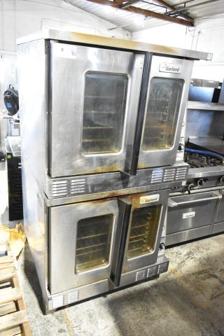 2 Garland Master 200 commercial convection ovens with view-through doors, metal racks, and thermostatic controls.