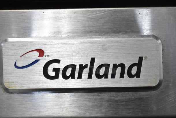 Garland Master 200 commercial convection oven label in brushed metal, showing the brand logo and name.