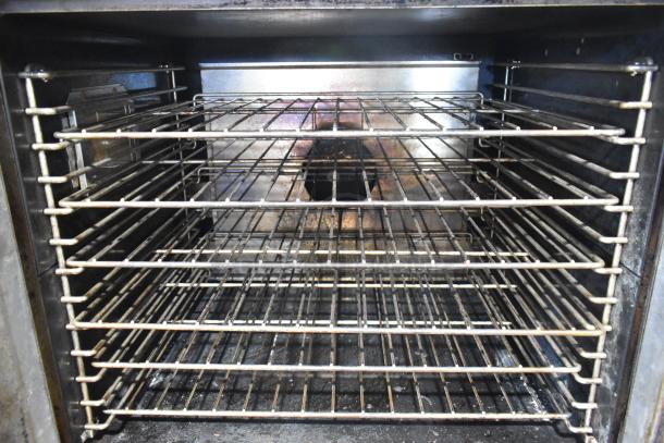 2 Garland Master 200 commercial convection ovens with view-through doors, metal racks, and thermostatic controls.