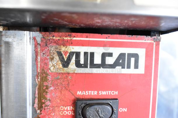Vulcan SG4D-1 convection oven control panel; shows wear and label details, including "Master Switch."