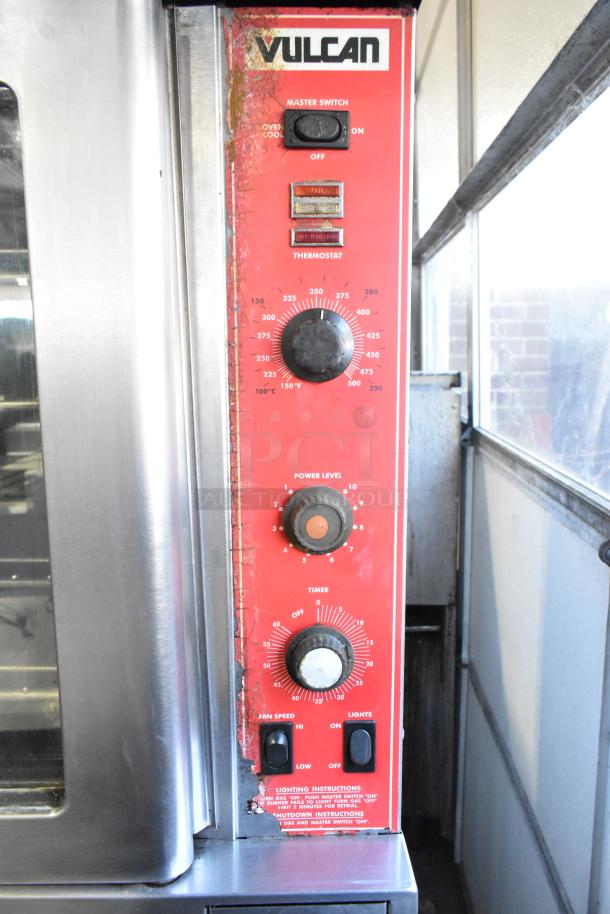 Vulcan SG4D-1 commercial convection oven panel, showing thermostat, power level, timer, and switches. Visible wear on red surface.