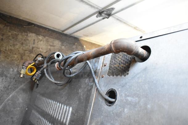 Vulcan SG4D-1 convection oven, metal racks, thermostatic controls, commercial casters, view-through doors, wiring visible.