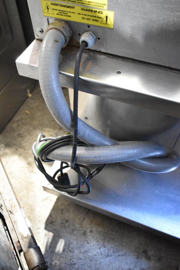 Mono FG180C-UZ52 electric convection oven, 308V, 3-phase. Features wiring details and warning label. Commercial use.