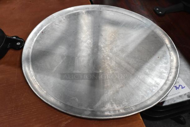 Round metal baking sheet, used condition, part of 51-item auction lot. Scratches visible; label shows "x2" marking.