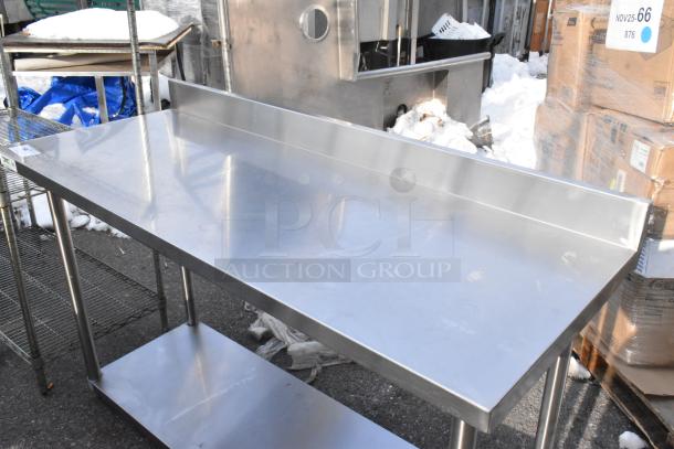 Regency 600TSB2460S stainless steel table with under shelf and backsplash. Clean, sturdy, used condition.