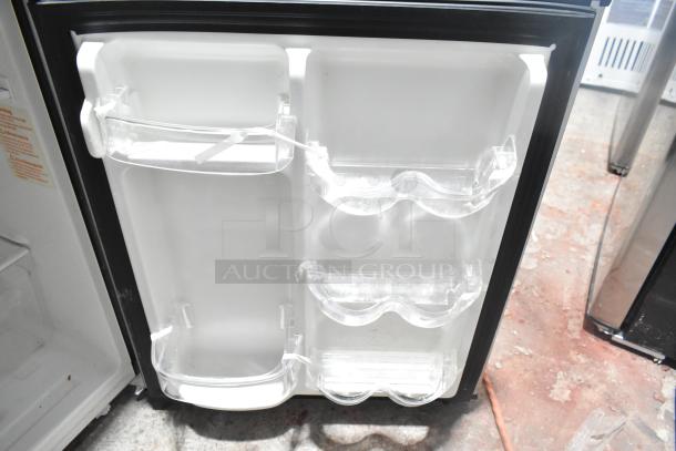 Magic Chef HMDR310SE mini cooler with freezer, brand new with minor scratches, 115 volts, 1 phase. Interior door view.