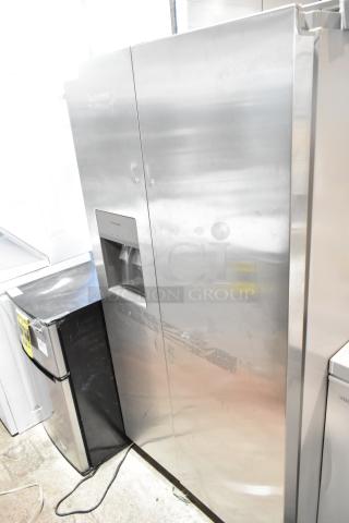 Brand new Frigidaire FRSS2623ASN French door cooler with drawer freezer, water/ice dispenser. Scratch and dent condition.