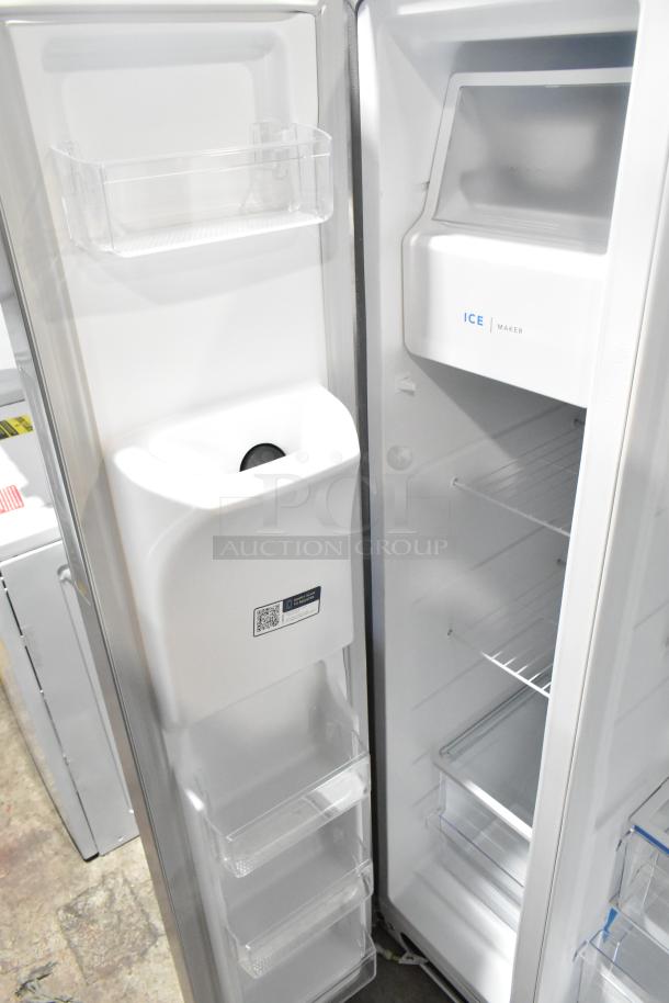 BRAND NEW Frigidaire FRSS2623ASN cooler with French doors, drawer freezer, water/ice dispenser. Scratch and dent condition.