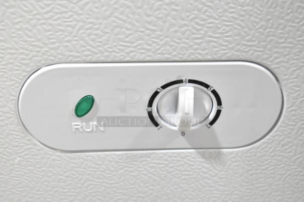 Close-up of Vissani chest freezer dial with temperature settings and green LED indicator labeled "RUN."