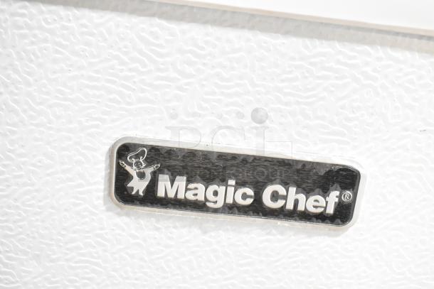 Magic Chef HMCF5W4 5.0 cu. ft. chest freezer, textured white finish, Magic Chef logo visible, 115V, 1 phase.