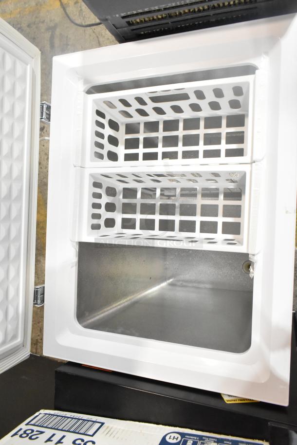 Magic Chef HMCF5W4 5.0 cu. ft. chest freezer, open lid, dual basket, 115 volts, clean interior, excellent condition.
