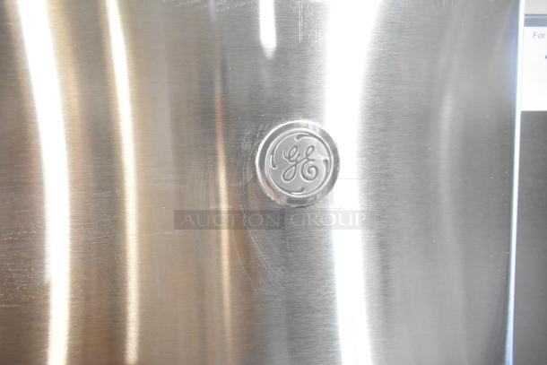 Brand new General Electric French door refrigerator model GNE27JYMYFFS, scratch and dent; stainless steel finish.