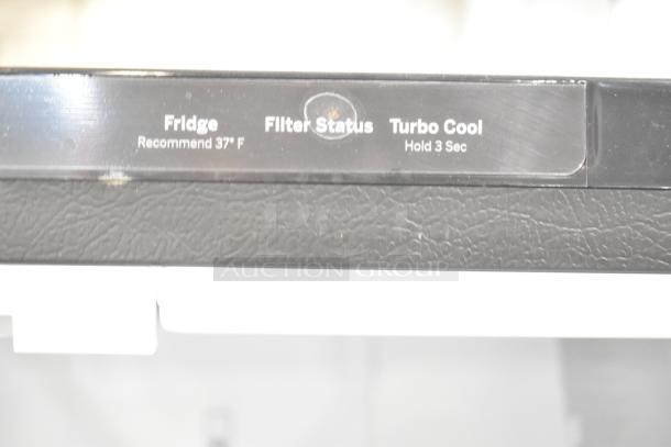 General Electric GE GNE27JYMYFFS fridge control panel showing "Fridge Recommend 37°F," "Filter Status," and "Turbo Cool Hold 3 Sec."