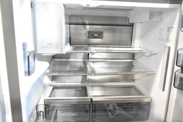 Brand new Frigidaire Professional French door fridge with drawer freezer, water/ice dispenser; minor scratches and dents visible.