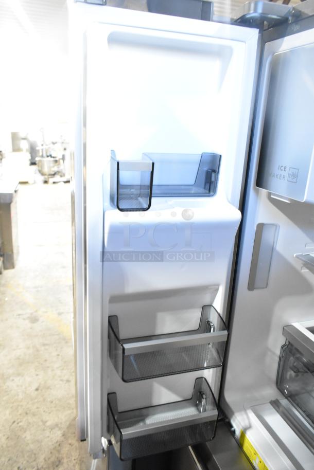 Frigidaire Professional French Door refrigerator with drawer freezer and water/ice dispenser, brand new with minor dents.