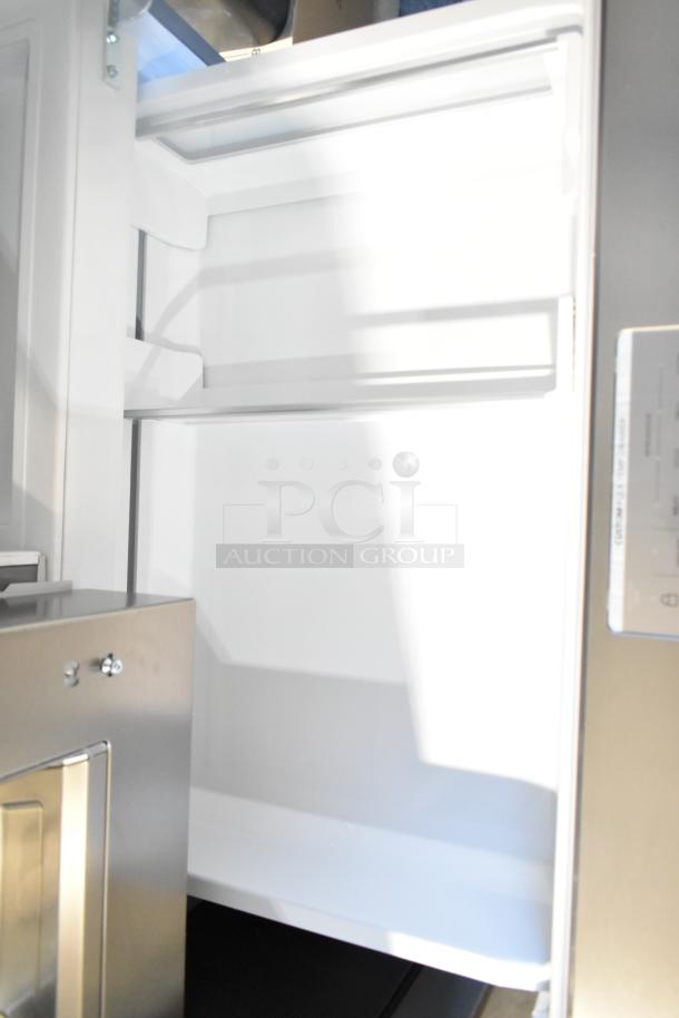 Brand new Frigidaire Professional French door cooler with drawer freezer, water/ice dispenser, scratch and dent.