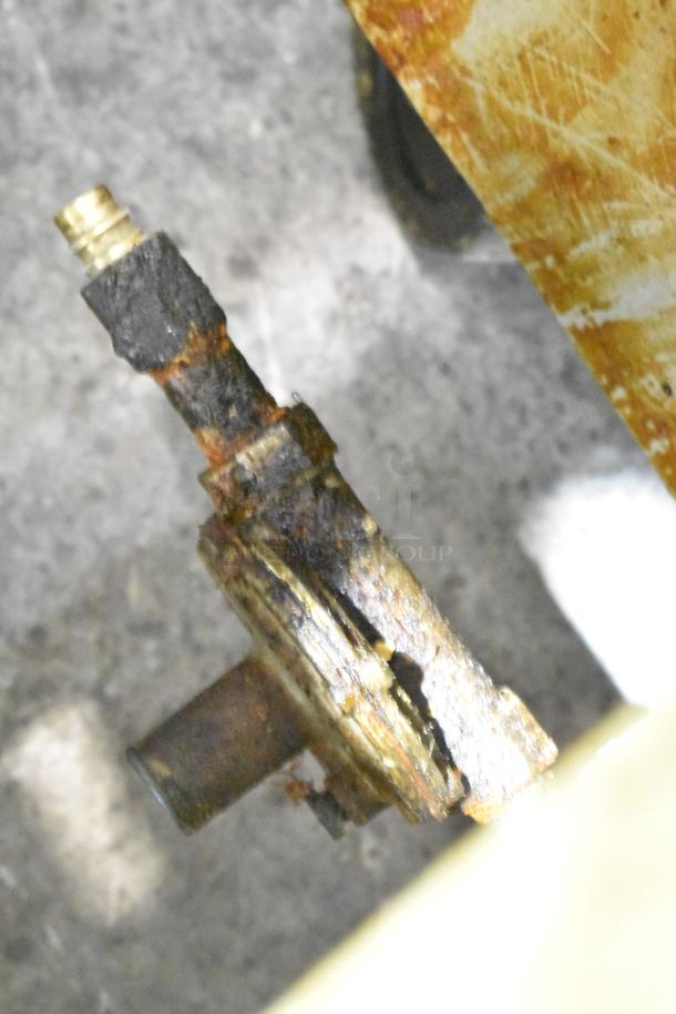 Corroded component of an Avantco F3-N deep fat fryer, indicating wear. Potential repair needed.