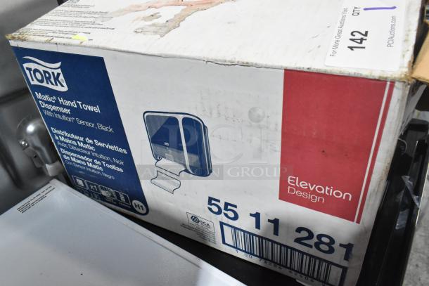 Tork 55 11 281 paper towel dispenser, brand new with scratch and dent, in original box, Intuition Sensor, black.