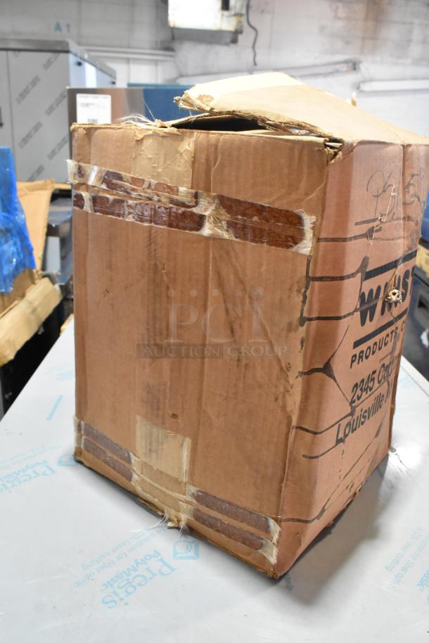 Brand new metal rack for Winston Pressure Fryer in scratched shipping box, labeled from Louisville.