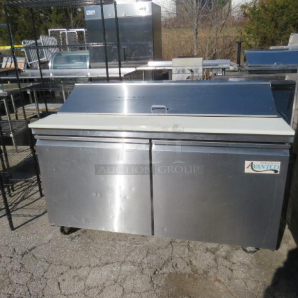 Avantco 178SSPT60HC refrigerated prep table with cutting board, two doors, two racks, on casters; 60x30.5x43.5 inches.
