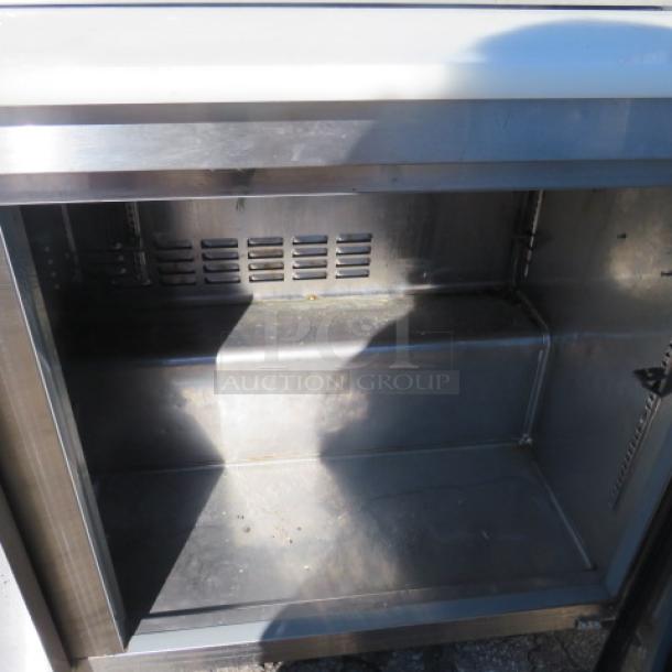 Avantco 2 Door Refrigerated Prep Table, Model 178SSPT60HC, with cutting board, two racks, casters, 115V, 60x30.5x43.5 inches.