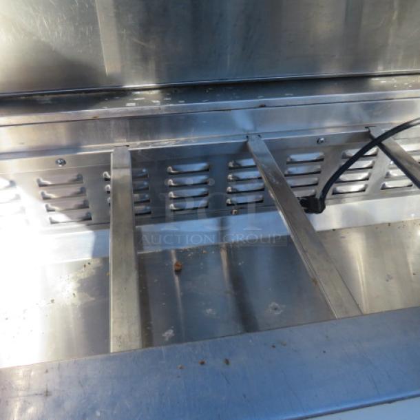 Avantco 2-door refrigerated prep table, model 178SSPT60HC, with cutting board, 2 racks, casters, 115V, stainless steel.