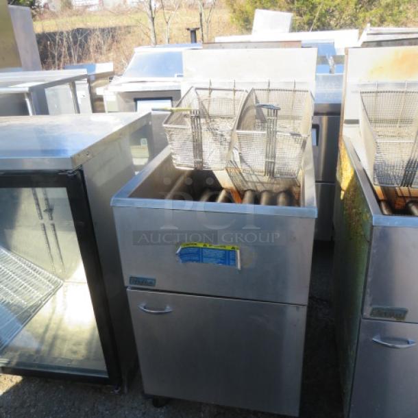 Pitco Natural Gas Deep Fryer Model 65C+ with two baskets, stainless steel, size 20x34x46 inches, visible label, used condition.