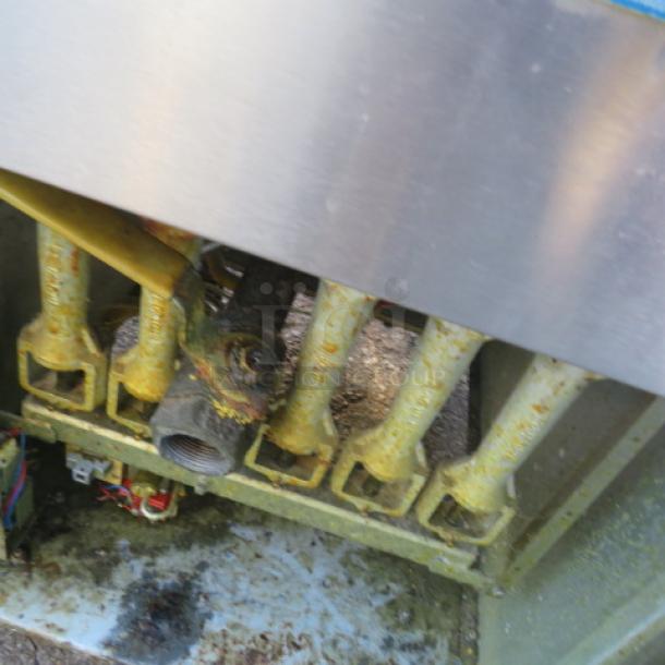 Pitco natural gas deep fryer, Model 65C+, visible wear, with 2 baskets. Dimensions: 20x34x46 inches.