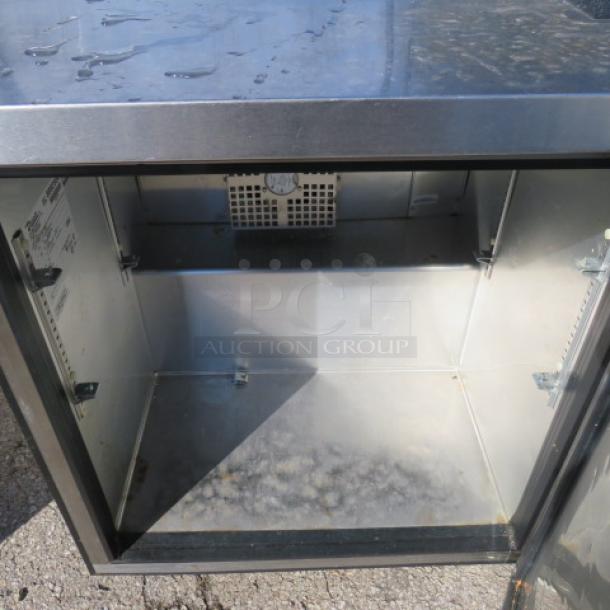 True TWT-27-HC Worktop Refrigerator, 1-door, stainless steel, on casters, interior view, 27.5x30x39.5 inches.