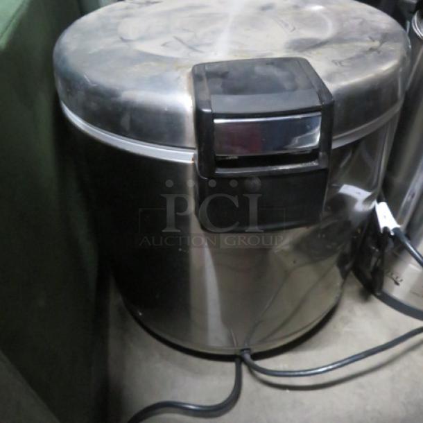 Tiger 50 Cup Rice Warmer, Model THC-90UA, 120 Volt, stainless steel finish, visible power cord, used condition.