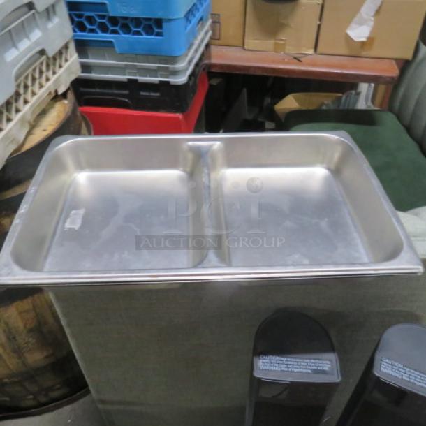Stainless steel divided hotel pan, full-size, 2.5-inch deep, used condition, dual compartments, ideal for catering.