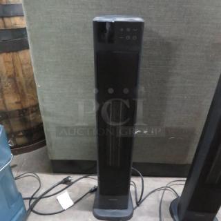 Pelonis Tower Ceramic Heater PHT30D7BBB, 1500W, 120V, sleek black design, control panel, good condition, priced at $91.99.