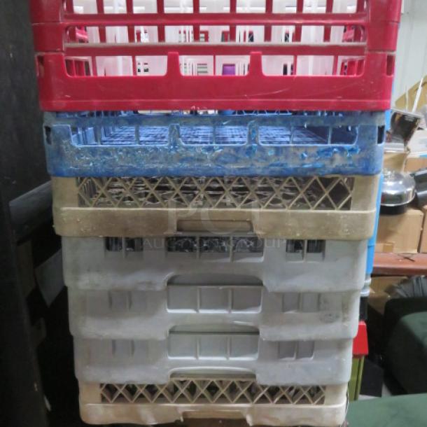 Assorted dishwasher racks, stacking set of four in red, blue, and beige. Used condition, ideal for organization. Model 7XBID.