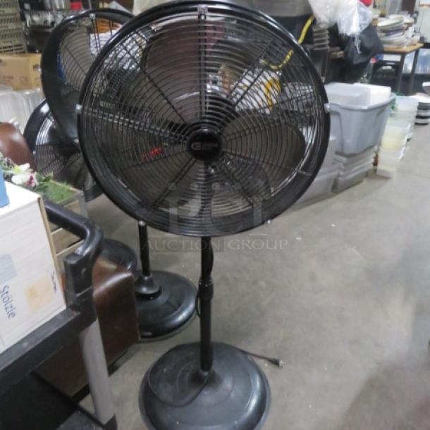 Commercial Electric Stand Fan, model SFSD1-1500BIW, 120V. Black, sturdy base, in used condition, suitable for large spaces.