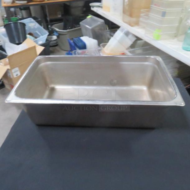 Full-size 6-inch deep hotel pan, stainless steel, good condition. Ideal for commercial kitchens or catering setups.