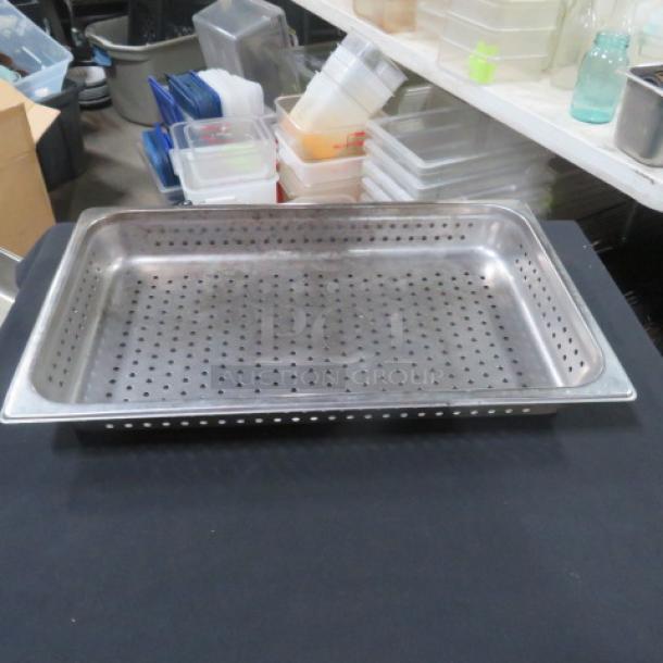 Full-size 2.5-inch deep perforated hotel pan, stainless steel, used condition. Ideal for steam cooking, no visible markings.
