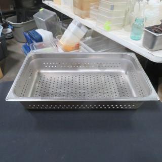 Full-size 4-inch deep perforated hotel pan, stainless steel, excellent condition, ideal for steam table use.