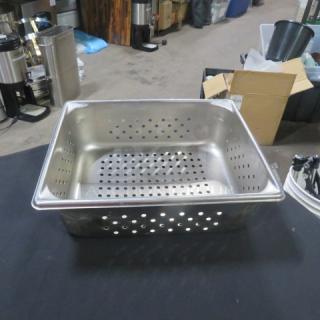 Half size 4-inch deep perforated hotel pan. Stainless steel, good condition, visible perforations for draining.