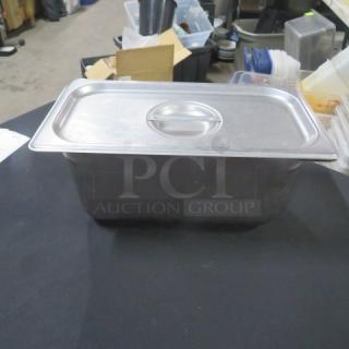 1/3 Size 6-inch deep stainless steel hotel pan with lid. Used condition. Ideal for commercial kitchen use.