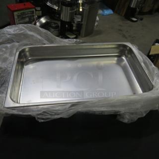 NEW full-size 2.5-inch stainless steel hotel pan, in pristine condition, wrapped in plastic.