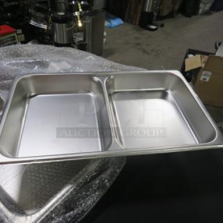 New full-size 2.5-inch deep divided hotel pan, stainless steel. Two compartments, ideal for buffet or catering use.