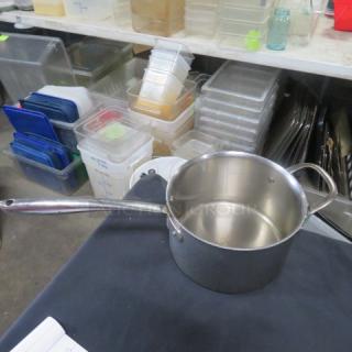 Williams Sonoma stainless steel Thermo-Clad saucepan, 8.5x5 inches. Gently used; features a long handle for easy pouring.
