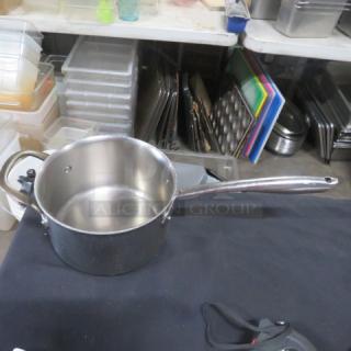 Williams Sonoma stainless steel Thermo-Clad saucepan, 7.5x5 inches, excellent condition, long handle design.