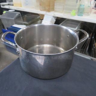 Vollrath 18qt stainless steel stock pot, Model 47722, 11.5x11 inches, with sturdy handles, in good condition.