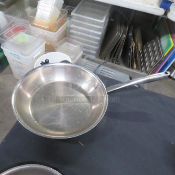 Williams Sonoma 11-inch stainless steel sauté pan, excellent used condition, long handle, ideal for versatile cooking.