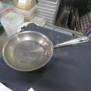 Williams Sonoma All Clad 8.5" stainless steel sauté pan, used condition, featuring sturdy riveted handle.