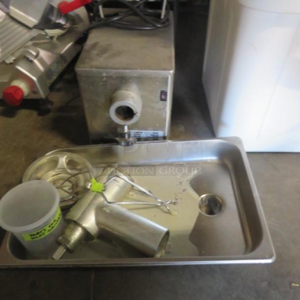 Pro Cut KG-12-FS meat grinder, 115V, disassembled parts on tray, used condition. Model and brand visible.